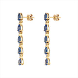 Elegant 14K yellow gold drop earrings featuring a linear design of pear-shaped kyanites totaling 4.96ct, each paired with a prong-set diamond (0.24ct total), for a refined and graceful look.