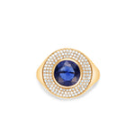Striking 14K yellow gold chunky signet ring featuring a breathtaking blue sapphire, encircled by a dazzling pavé diamond halo, blending bold elegance with radiant sparkle.