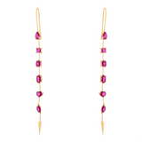 Refined 14K yellow gold linear drop earrings featuring six fancy-cut rubies in oval, princess, emerald, pear, solitaire, and marquis shapes, totaling 1.03ct and measuring 2.15 inches in length.