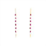 Refined 14K yellow gold linear drop earrings featuring six fancy-cut rubies in oval, princess, emerald, pear, solitaire, and marquis shapes, totaling 1.03ct and measuring 2.15 inches in length.