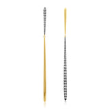 Stylish mismatched drop earrings crafted in 14K yellow and white gold, featuring sleek straight-line bar designs with alternating diamond accents for a unique and modern contrast. Close up. 