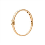 Refined 14K yellow gold bangle bracelet featuring 10 mixed-shape diamonds totaling 1.76ct, arranged in a sleek row for a timeless and elegant design.