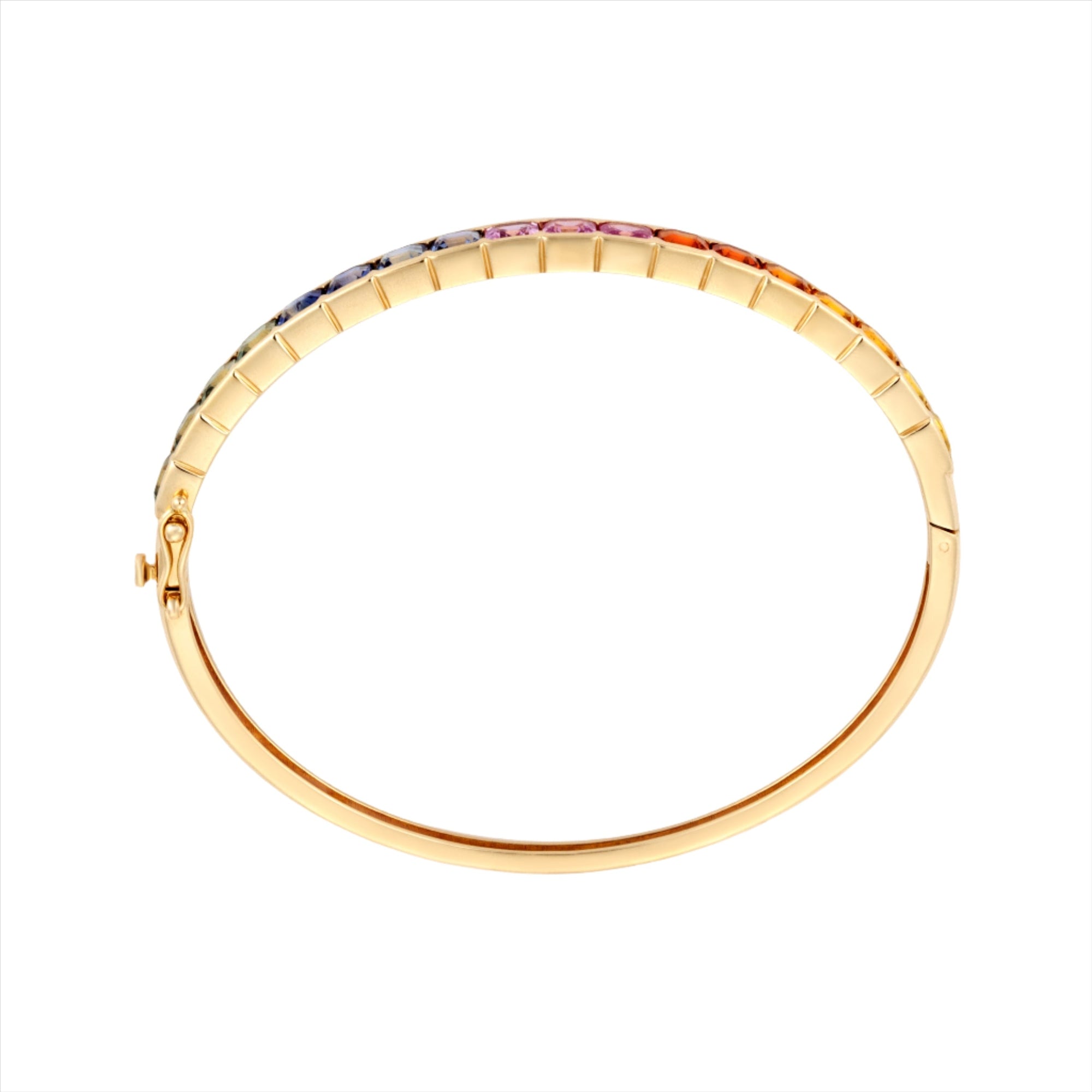 Striking 14K yellow gold bangle featuring a radiant array of multi-colored sapphires totaling 15.72ct. Weighing 12.21g, this bold and colorful bracelet brings playful elegance to any look.