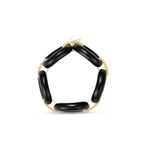 Bold and sophisticated chain link bracelet featuring sleek jet-black onyx links paired with shimmering pavé diamonds, crafted in yellow gold for a luxurious and versatile design that transitions effortlessly from day to night. Top down, side view.