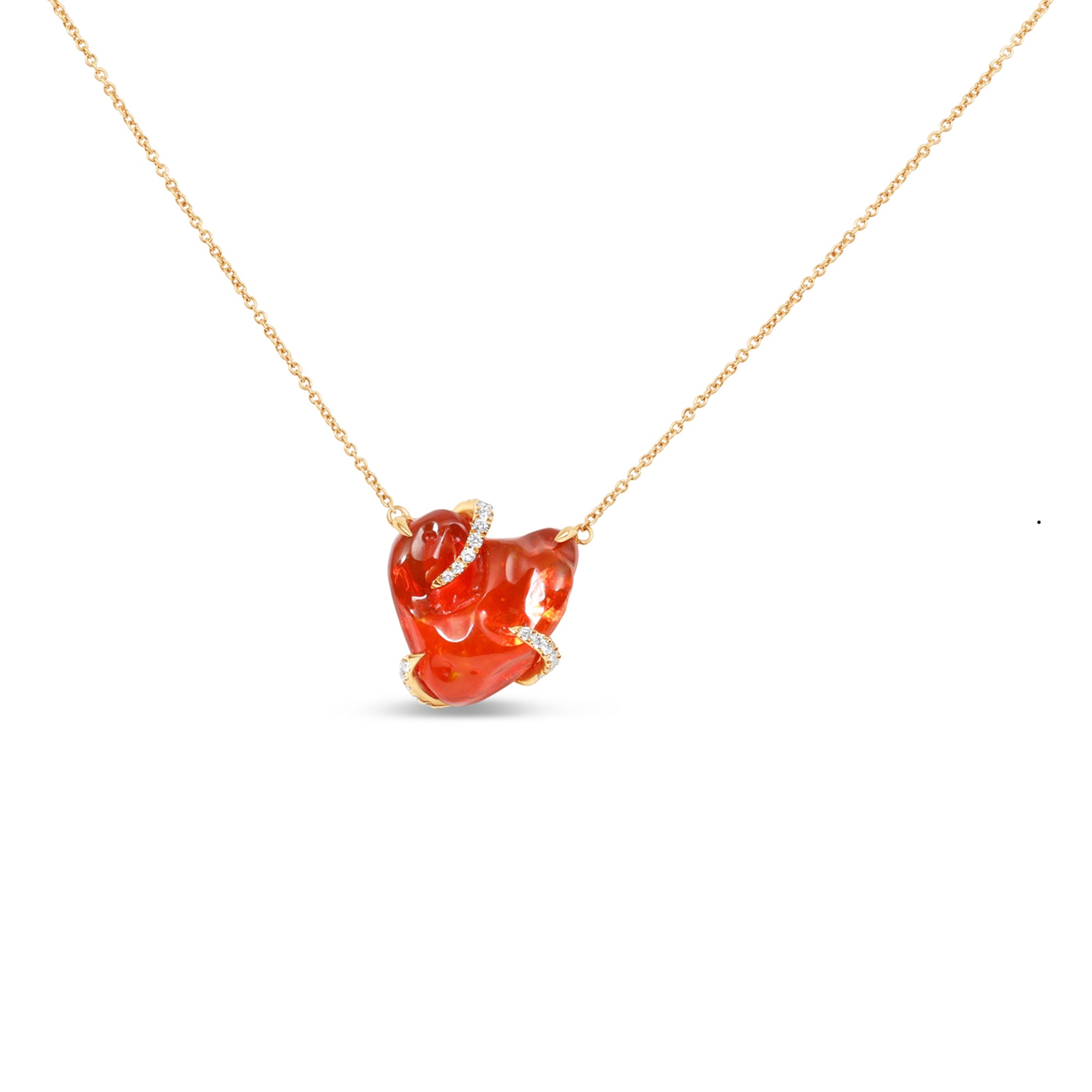 Captivating 18K rose gold pendant necklace featuring a free-form organic fire opal with vibrant red hues, accented by sparkling diamond prongs for a one-of-a-kind elegant masterpiece. Close up view.