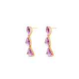 Dazzling pink sapphire drop earrings featuring three luminous sapphires totaling approximately 2ct, elegantly set in 14K yellow gold for a timeless blend of charm and sophistication. Side view.