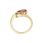 Chic 14K yellow gold bypass ring featuring two vibrant pear-shaped pink tourmalines totaling 1.45ct, designed with a graceful silhouette for a modern pop of color.