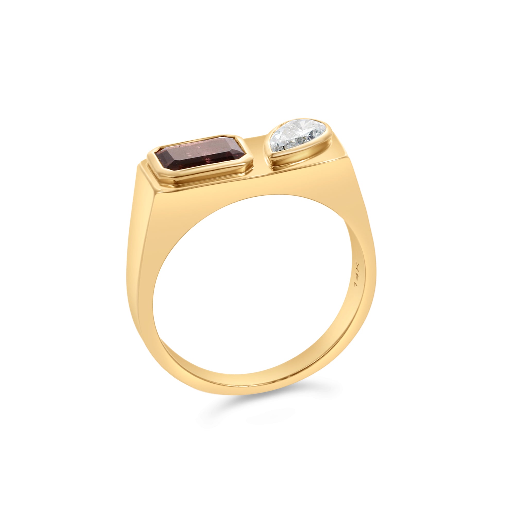 Elegant 14K yellow gold east-west ring featuring a bezel-set emerald-cut pink tourmaline and a pear-shaped diamond, blending contemporary design with timeless sophistication. Side angle close up. 