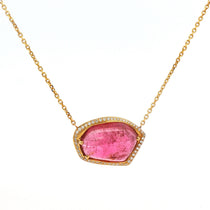 Elegant jelly-style pendant featuring an 11.86ct freeform pink tourmaline surrounded by a 0.45ct diamond halo, set in 18K yellow gold with an adjustable 16–18 inch chain.