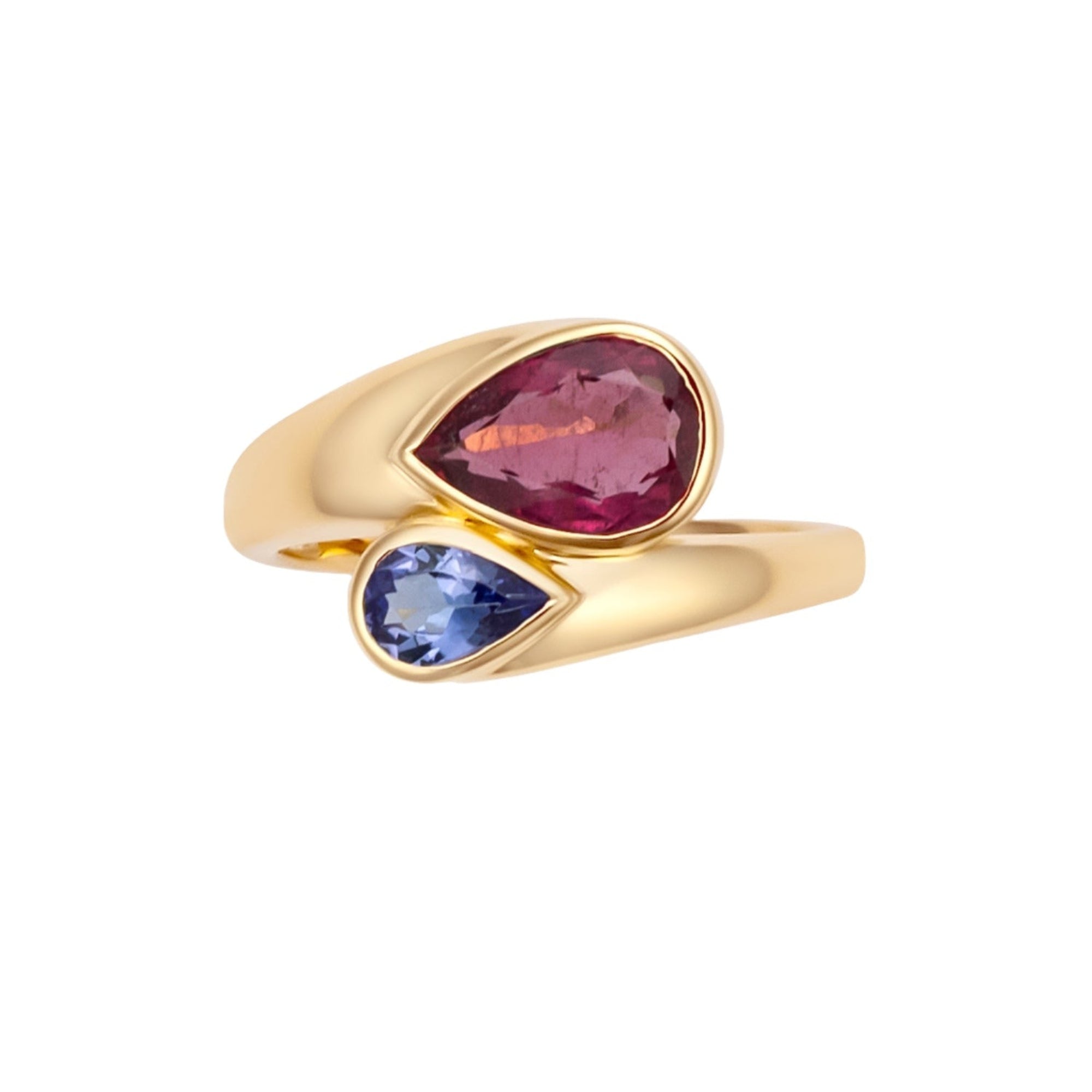 Elegant 14K yellow gold bypass ring featuring a vibrant 1.4ct pink tourmaline and a striking 0.5ct iolite gemstone, offering a bold yet graceful contrast of color and design.