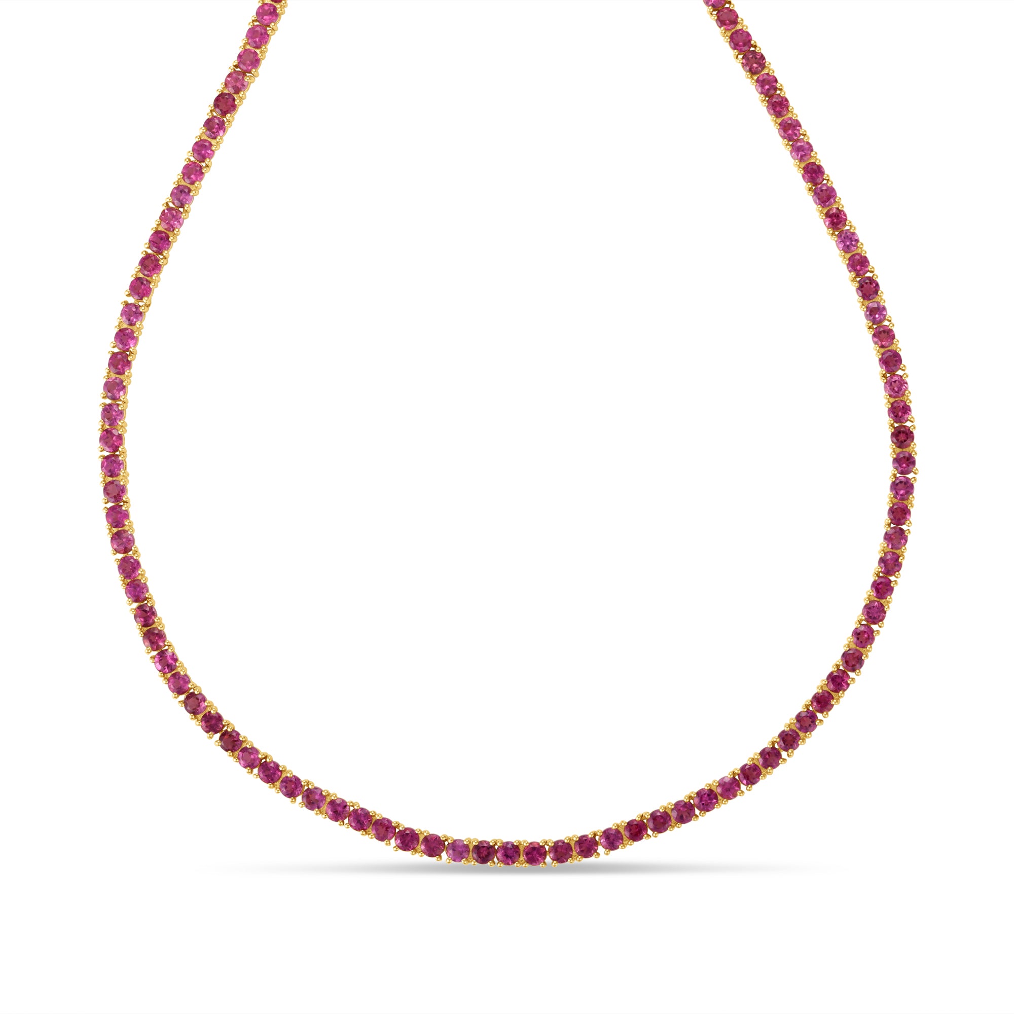 Exquisite 14K yellow gold tennis necklace featuring captivating pink tourmalines, celebrated for their romantic hue and timeless elegance, perfect for adding a touch of luxury and color to any look." Close UP 
