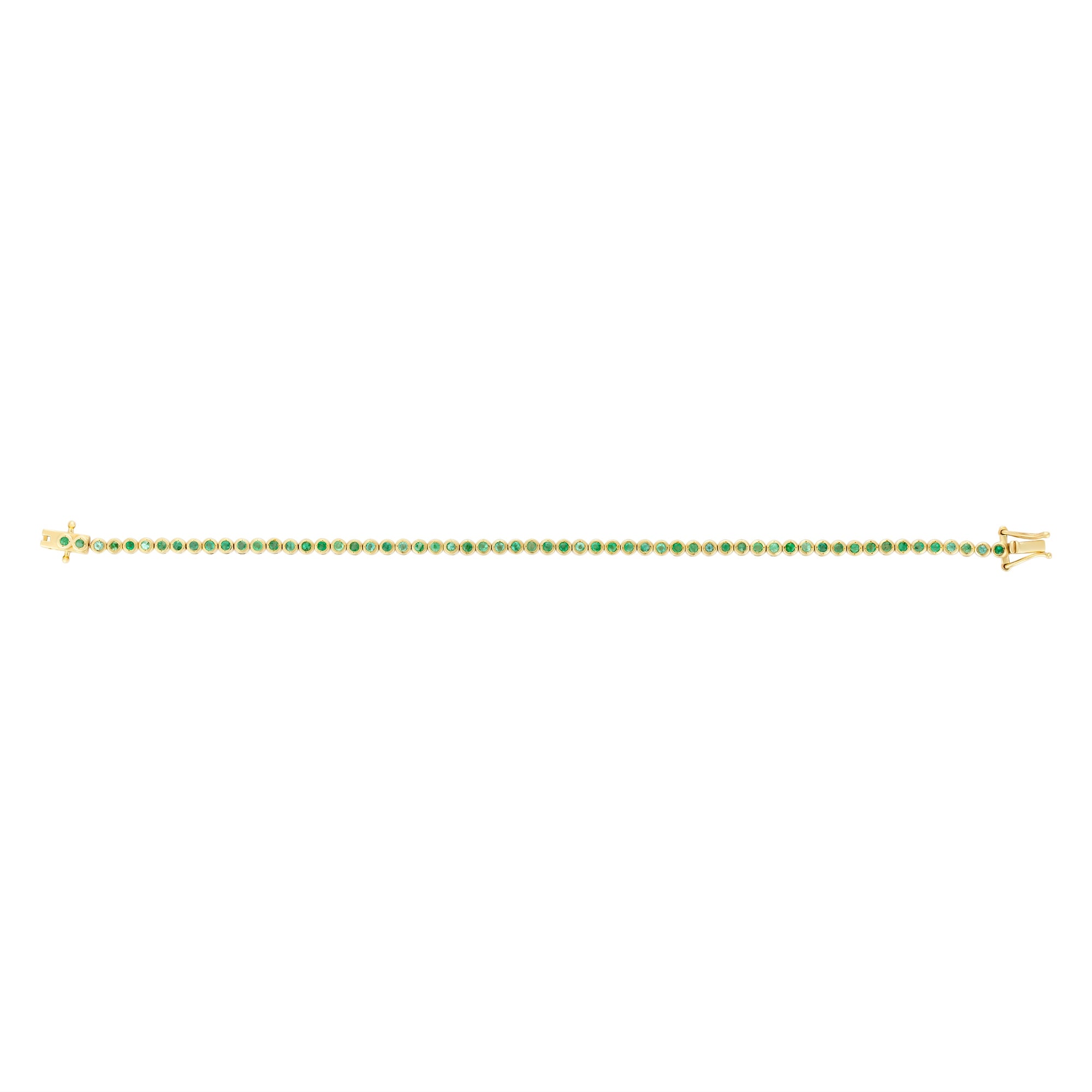 Delicate 14K yellow gold tennis bracelet featuring round bezel-set emeralds totaling 1.12ct. Lightweight at 6.1g, this refined bracelet offers timeless elegance with a pop of green.