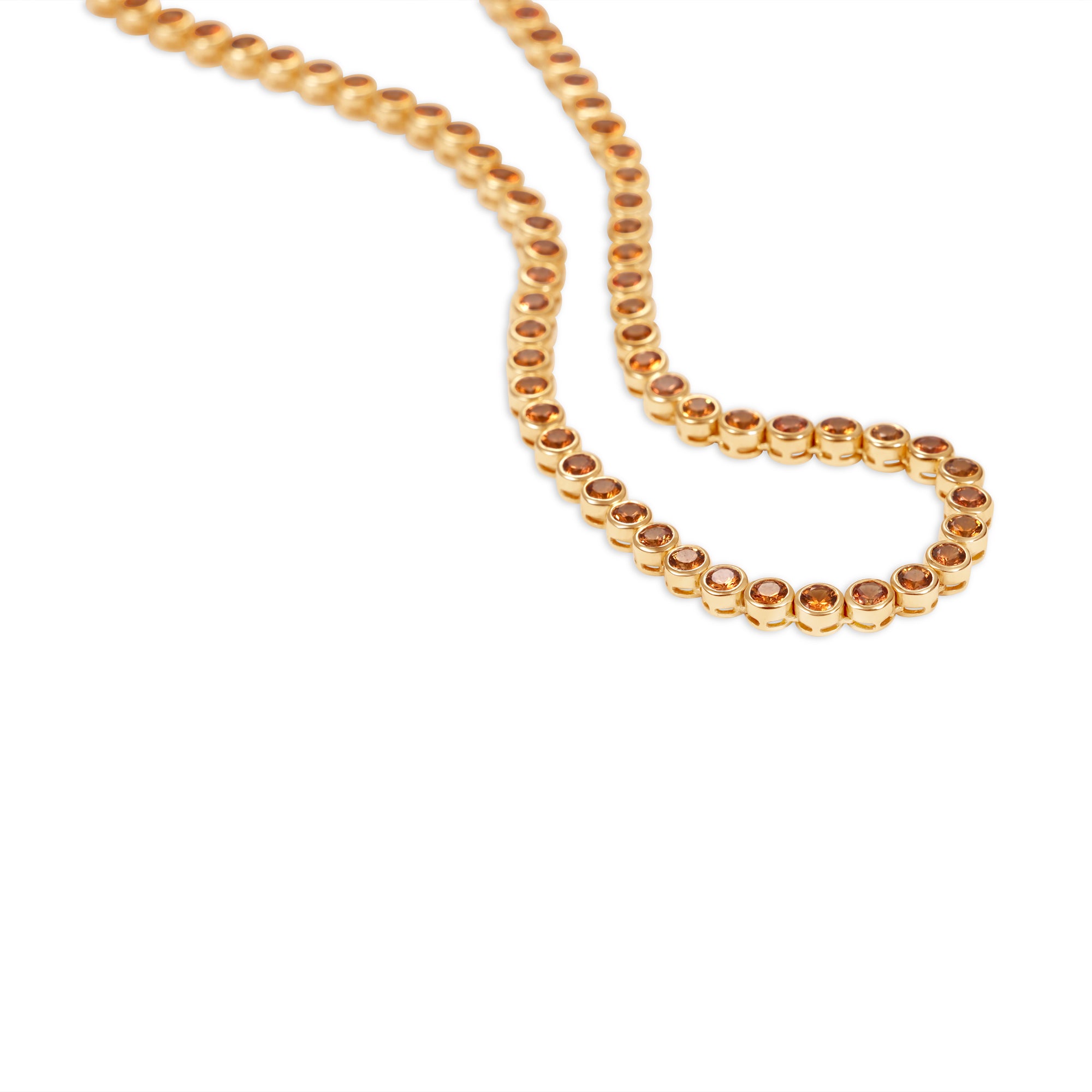 Stunning 14K yellow gold tennis necklace featuring vibrant bezel-set orange sapphires, with warm golden tones enhancing the gemstones' fiery brilliance and luxurious elegance.
