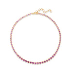 Elegant 14K yellow gold tennis necklace featuring vibrant round-cut pink sapphires in secure bezel settings, offering timeless beauty with a modern edge. Full view.