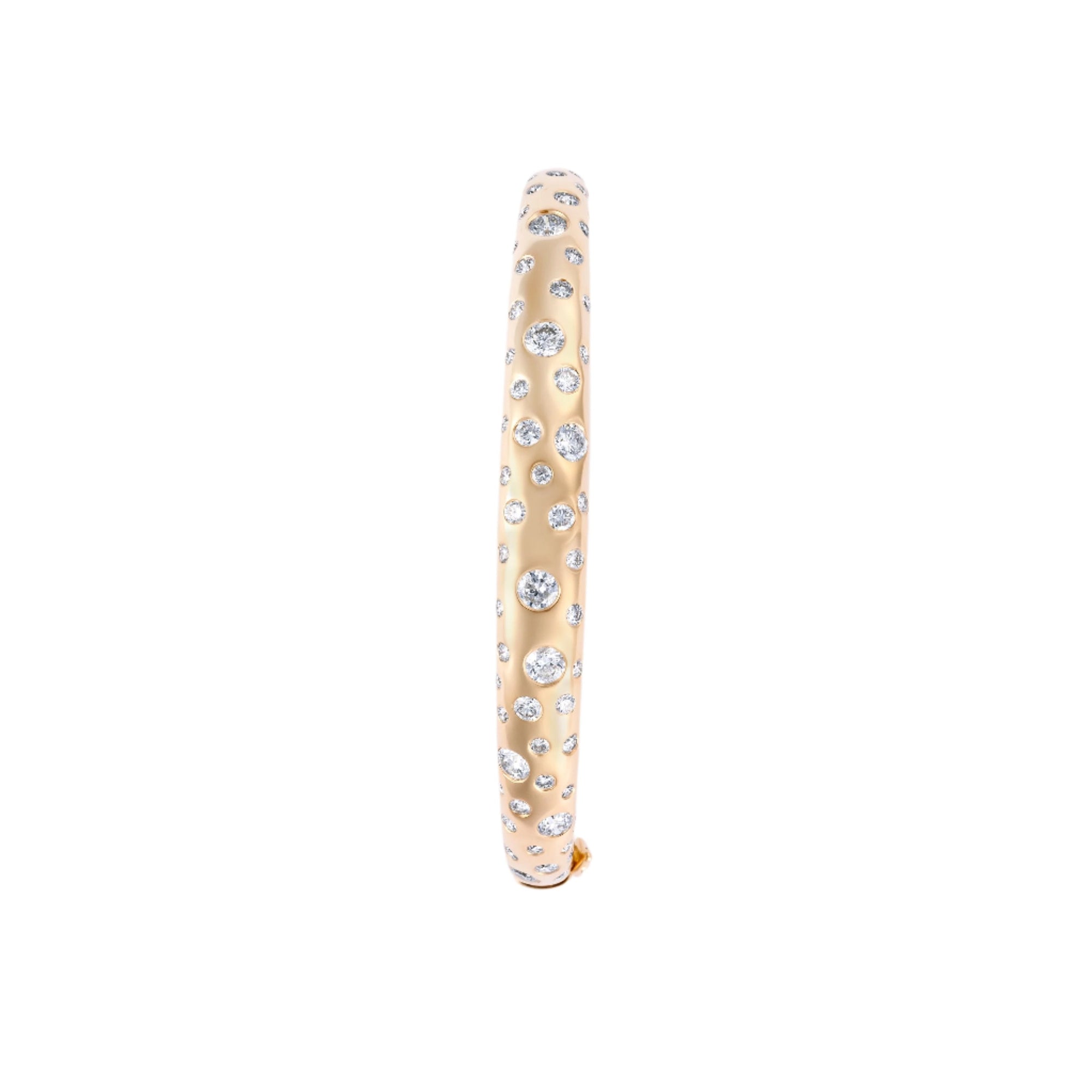 Elegant 14K yellow gold bangle featuring a radiant spray of diamonds totaling 2.52ct, with a refined, sculptural design and a total weight of 15.02g.