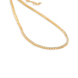 Elegant adjustable tennis necklace featuring a series of dazzling diamonds set in square bezels, offering a radiant sparkle and versatile design perfect for any occasion. Close up of side 