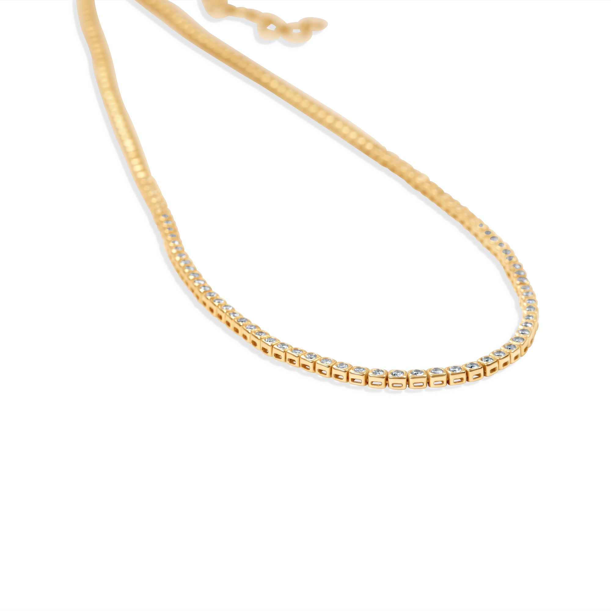 Elegant adjustable tennis necklace featuring a series of dazzling diamonds set in square bezels, offering a radiant sparkle and versatile design perfect for any occasion. Close up of side 