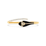 Captivating serpent bangle crafted in radiant 14K yellow gold, featuring a striking black enamel design accented with shimmering graduated diamonds, exuding bold sophistication and elegance.