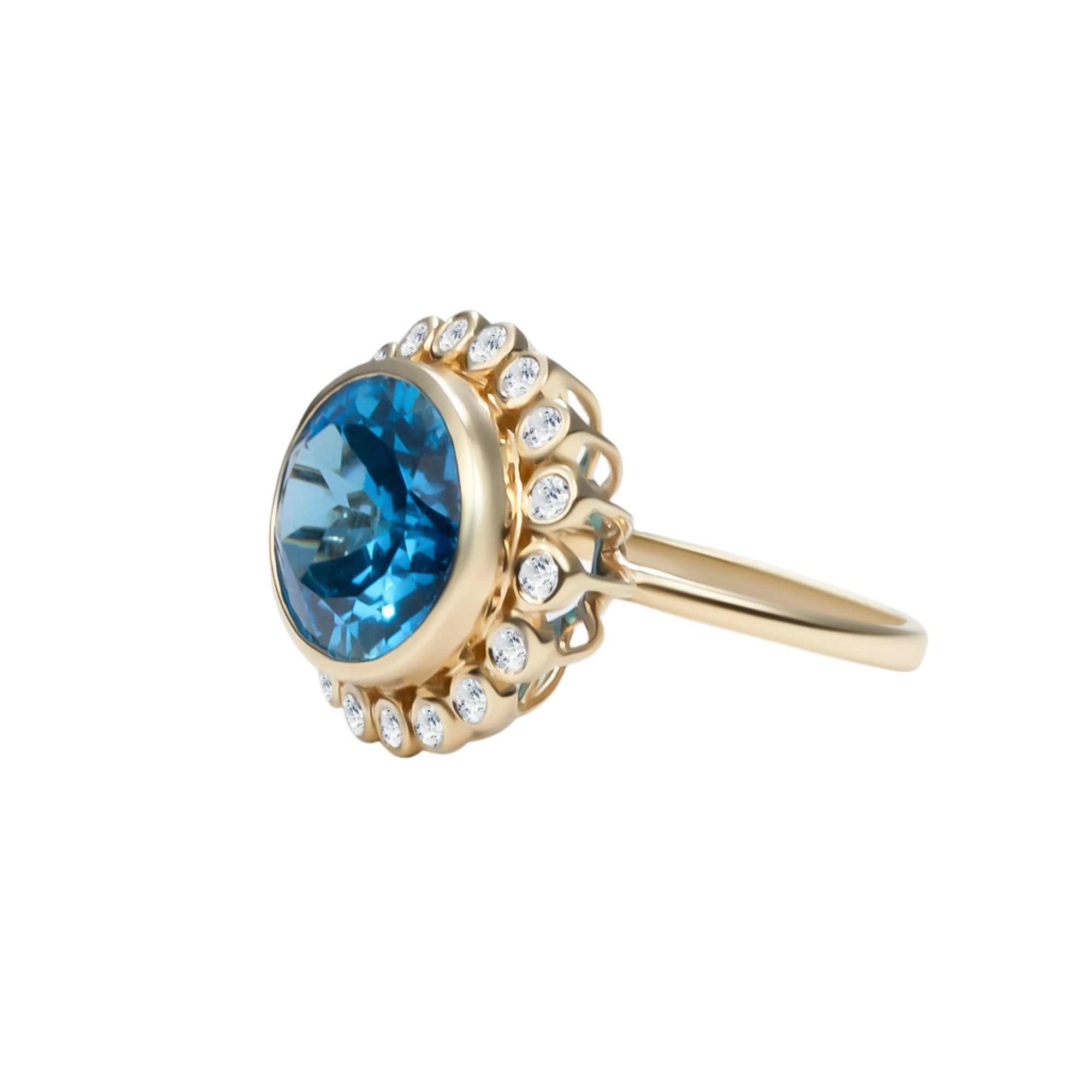 Captivating 14K yellow gold cocktail ring featuring a Swiss blue topaz surrounded by a sparkling diamond halo in a delicate anemone-inspired basket setting, offering vibrant elegance for any occasion.