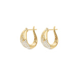 Elegant 14K yellow gold hoop earrings featuring a radiant spray of diamonds in a tapered silhouette, offering a refined, modern aesthetic and timeless sophistication. Close up of side view and a peek on the inside. 