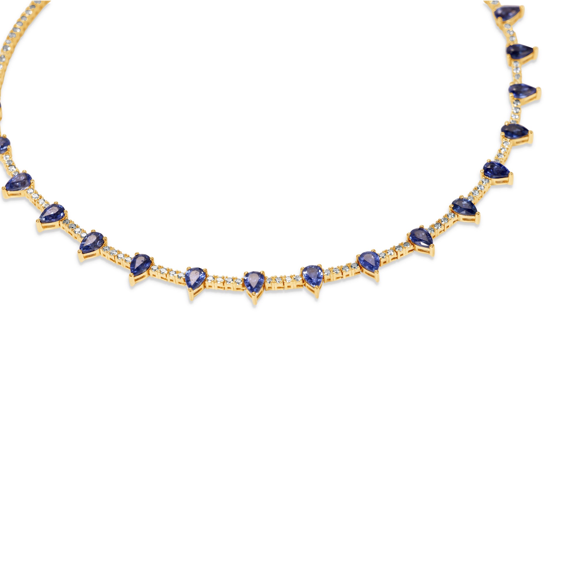 Elegant 14K yellow gold tennis necklace featuring a delicate diamond chain adorned with vibrant pear-shaped blue sapphires, offering an adjustable 15" to 17" fit for timeless sophistication. Close up, side.
