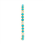 Elegant 14K yellow gold bangle featuring 3.78ct of vivid turquoise and 1.186ct of sparkling diamonds. Sized at 6cm, this gemstone bracelet offers a refined pop of color and shine.