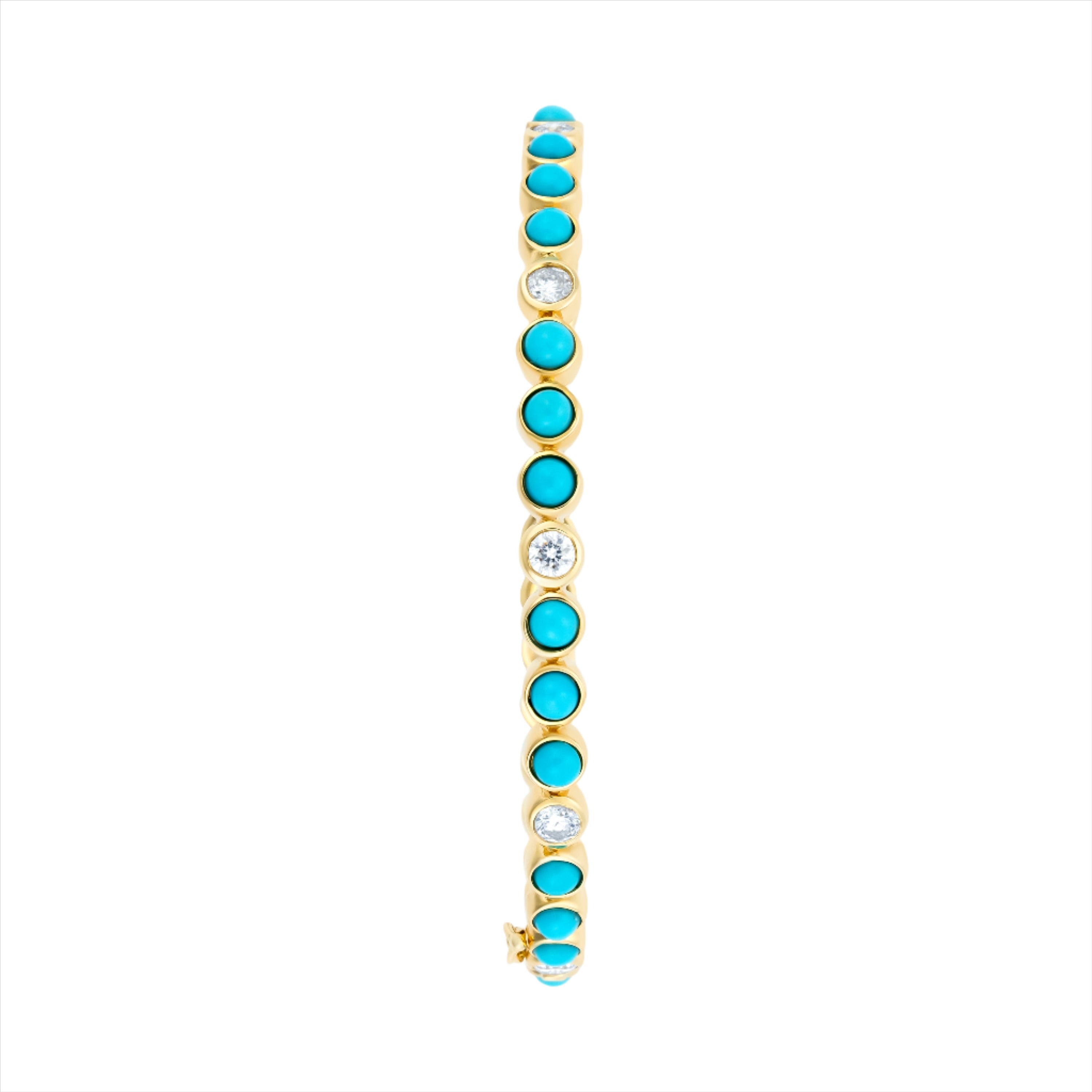 Elegant 14K yellow gold bangle featuring 3.78ct of vivid turquoise and 1.186ct of sparkling diamonds. Sized at 6cm, this gemstone bracelet offers a refined pop of color and shine.