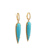 Elegant 14K yellow gold drop earrings featuring elongated pear-shaped turquoise stones encircled by shimmering pavé diamonds, creating a striking contrast between vibrant blue and warm gold. Close up. 