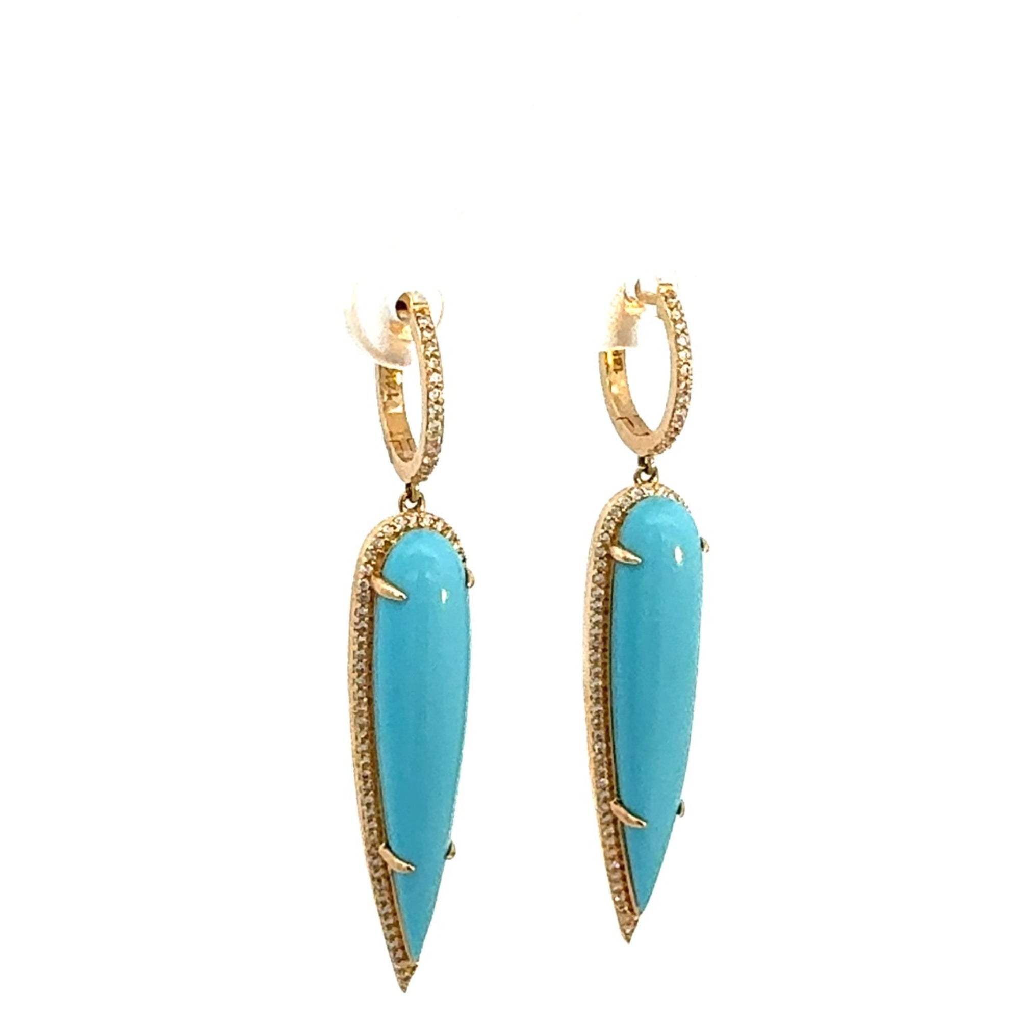 Elegant 14K yellow gold drop earrings featuring elongated pear-shaped turquoise stones encircled by shimmering pavé diamonds, creating a striking contrast between vibrant blue and warm gold. Close up. 