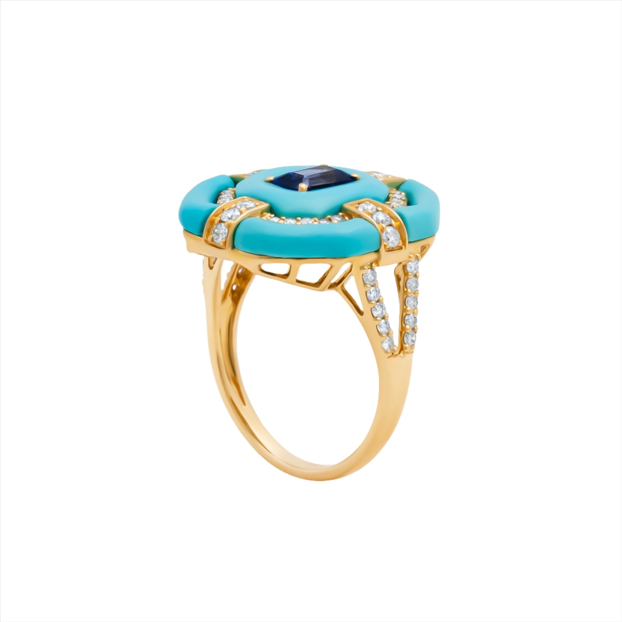 Bold 14K yellow gold cocktail ring featuring 9ct of hand-carved turquoise, a 0.75ct elongated emerald-cut sapphire, and 0.6ct of G-H VS diamonds in a striking Art Deco design.