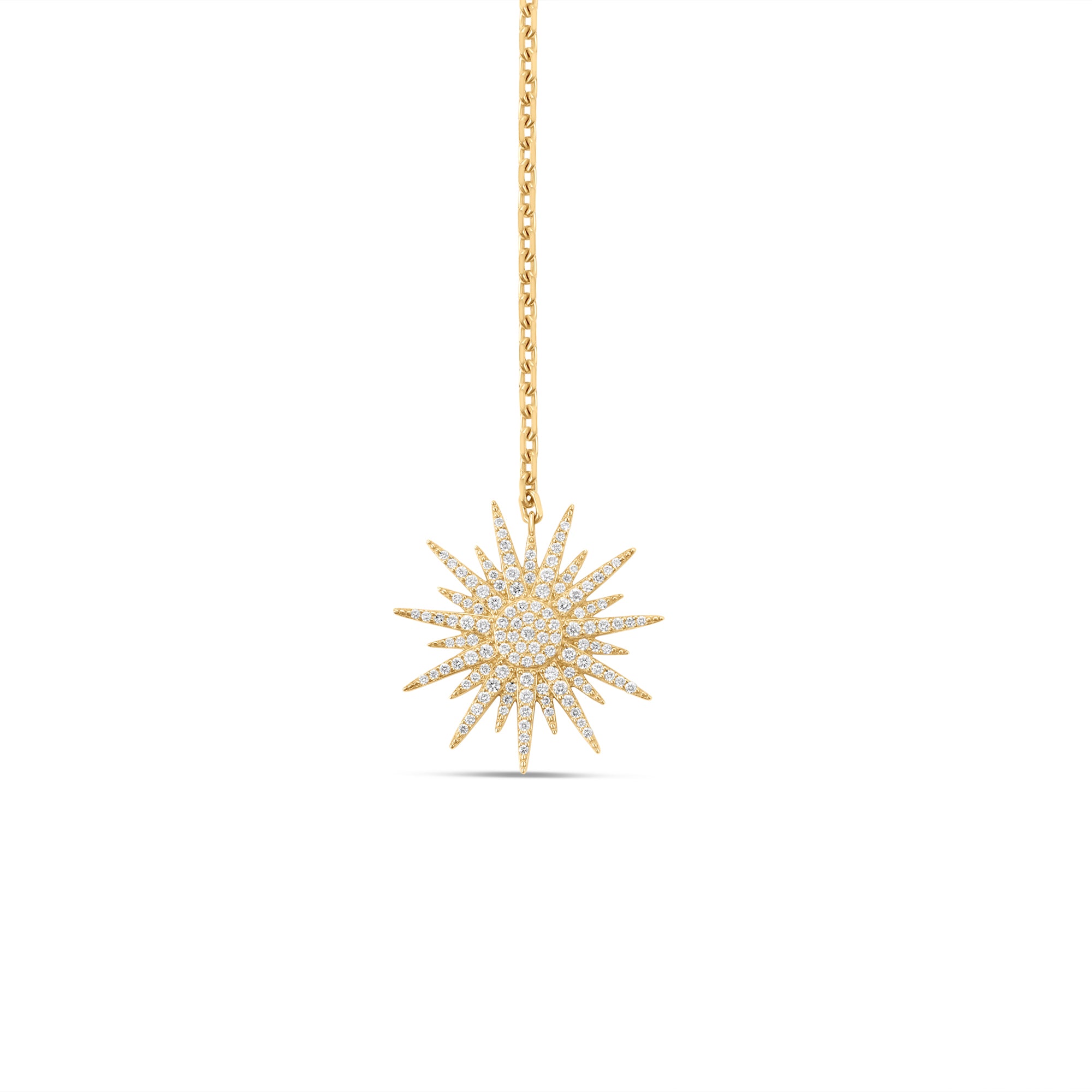Elegant celestial drop necklace crafted in 14K two-tone gold, featuring radiant diamonds that shimmer with every angle, blending modern style with timeless sophistication. Close up of Sun