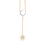 Elegant celestial drop necklace crafted in 14K two-tone gold, featuring radiant diamonds that shimmer with every angle, blending modern style with timeless sophistication. Close up of moon and sun.