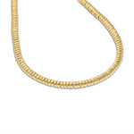 Petite 14K yellow gold necklace featuring elegant wave-inspired links with a polished finish and adjustable fit, offering timeless sophistication and versatile elegance. Close up. 