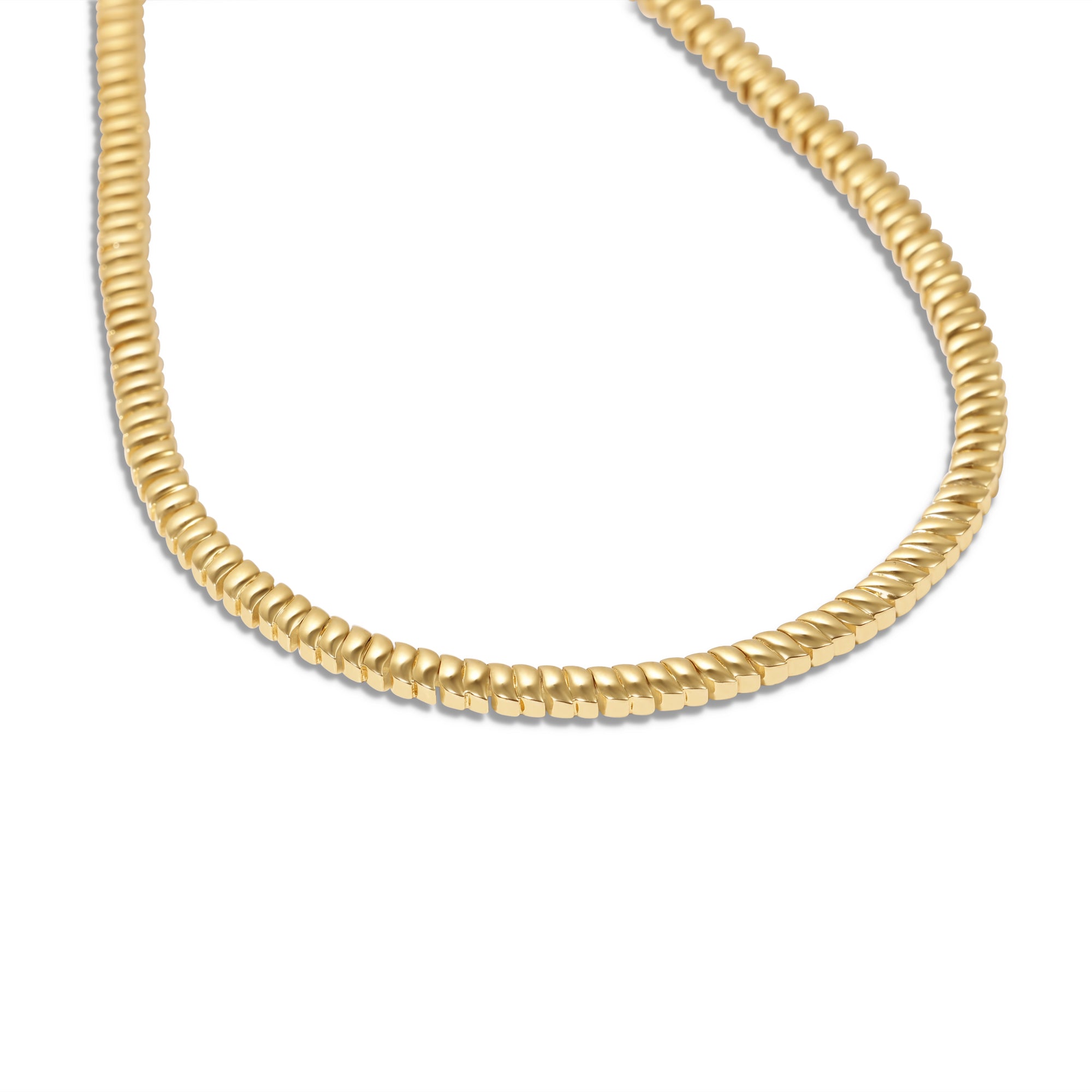 Petite 14K yellow gold necklace featuring elegant wave-inspired links with a polished finish and adjustable fit, offering timeless sophistication and versatile elegance. Close up. 