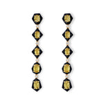 Stunning 14K yellow gold drop earrings featuring vibrant yellow sapphires, shimmering diamonds, and sleek black enamel accents, radiating bold sophistication and refined elegance."