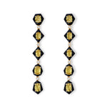 Stunning 14K yellow gold drop earrings featuring vibrant yellow tourmalines, shimmering diamonds, and sleek black enamel accents, radiating bold sophistication and refined elegance.
