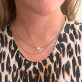 Lab diamond emerald cut bezel set pendant necklace by Elyzian Fine Jewelry