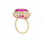 Side view: Elyzian Anemone Cocktail Ring in pink topaz, diamond and yellow gold. Delicate basket setting with bezel set diamonds.