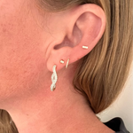 Dual Tone Inside-Out Pavé Diamond Squiggle Hoop Earrings in 14K Gold by Elyzian
