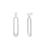 Gracefully designed drop earrings in 18K white gold, featuring dazzling diamonds and luminous pearls, offering refined craftsmanship and timeless allure for special occasions. Front and Angled. 