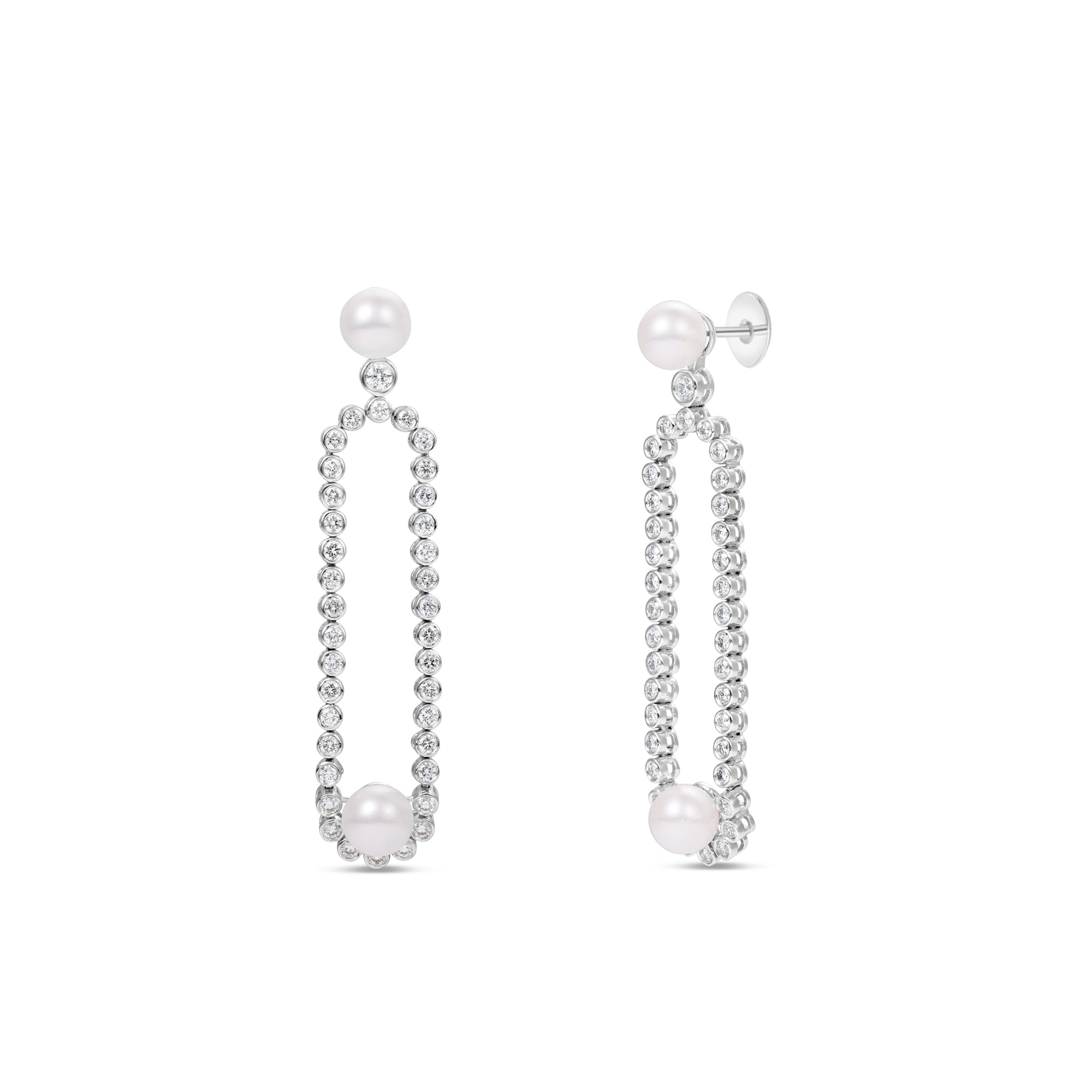 Gracefully designed drop earrings in 18K white gold, featuring dazzling diamonds and luminous pearls, offering refined craftsmanship and timeless allure for special occasions. Front and Angled. 