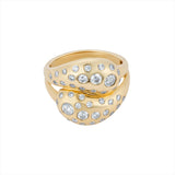 Exquisite 14K yellow gold knot ring featuring a 1.067ct spray of G-H VS diamonds, combining graceful curves with radiant brilliance in a timeless design.