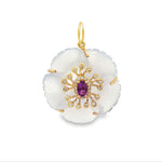Floral pendant with gold and gemstone details on a white background