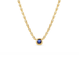 Sophisticated 14K yellow gold pendant necklace featuring a bezel-set blue sapphire centerpiece with sparkling diamonds along an adjustable mini rolo chain, offering timeless luxury and refined elegance.