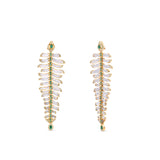 One-of-a-kind 14K yellow gold feather earrings featuring clear rock quartz, emeralds, and sparkling diamonds, designed for versatility—wear them as statement dangle earrings or transform the detachable feathers into a unique bracelet complemented by emerald stud earrings. Shown as earrings. 