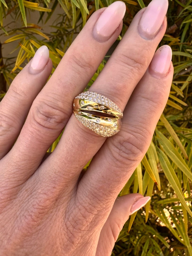 Diamond Pavé Crossover Bombé Ring in 14K Yellow Gold worn on finger
