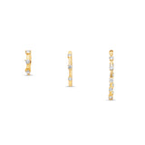 Small, medium, and large Diamond Prong Set Huggie Hoop Earrings in 14K Yellow Gold by Elyzian – front view
