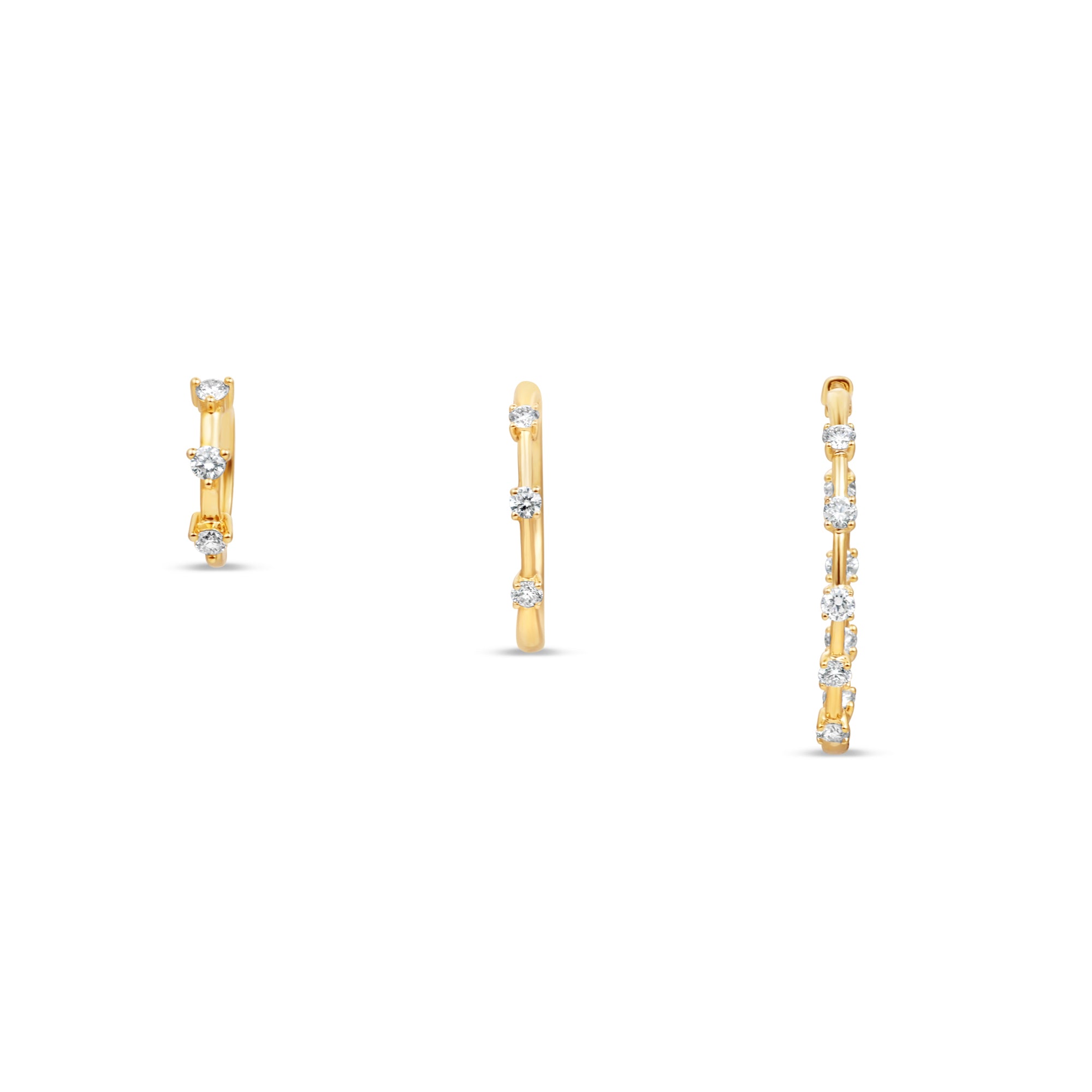 Small, medium, and large Diamond Prong Set Huggie Hoop Earrings in 14K Yellow Gold by Elyzian – front view