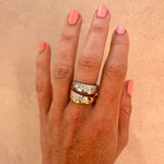 Dual-tone cigar band on a white background; both yellow and white gold have scattered natural diamonds.