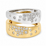 Dual-tone cigar band on a white background; both yellow and white gold have scattered natural diamonds.